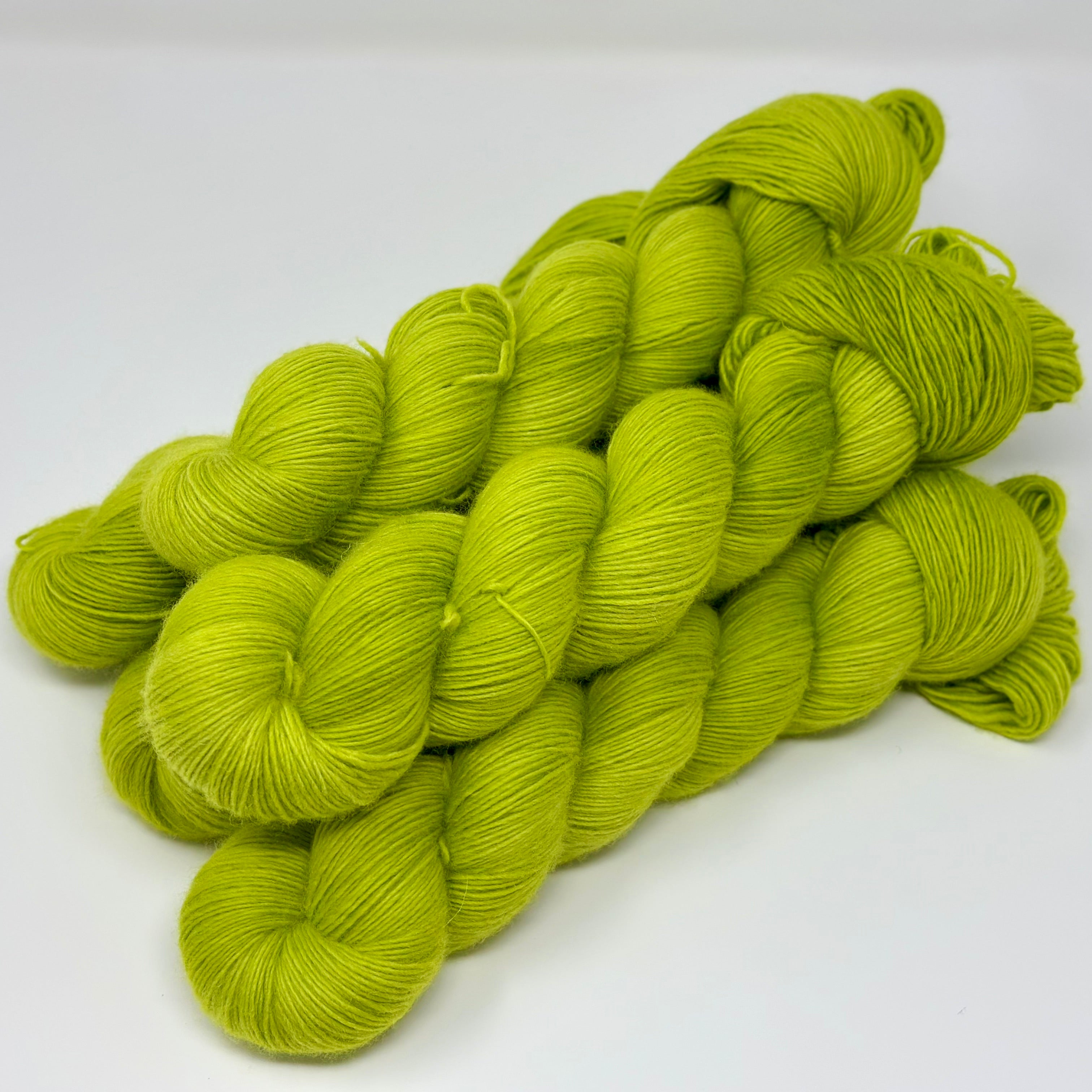 Organic Merino Fingering yarn in Apple Jolly Rancher