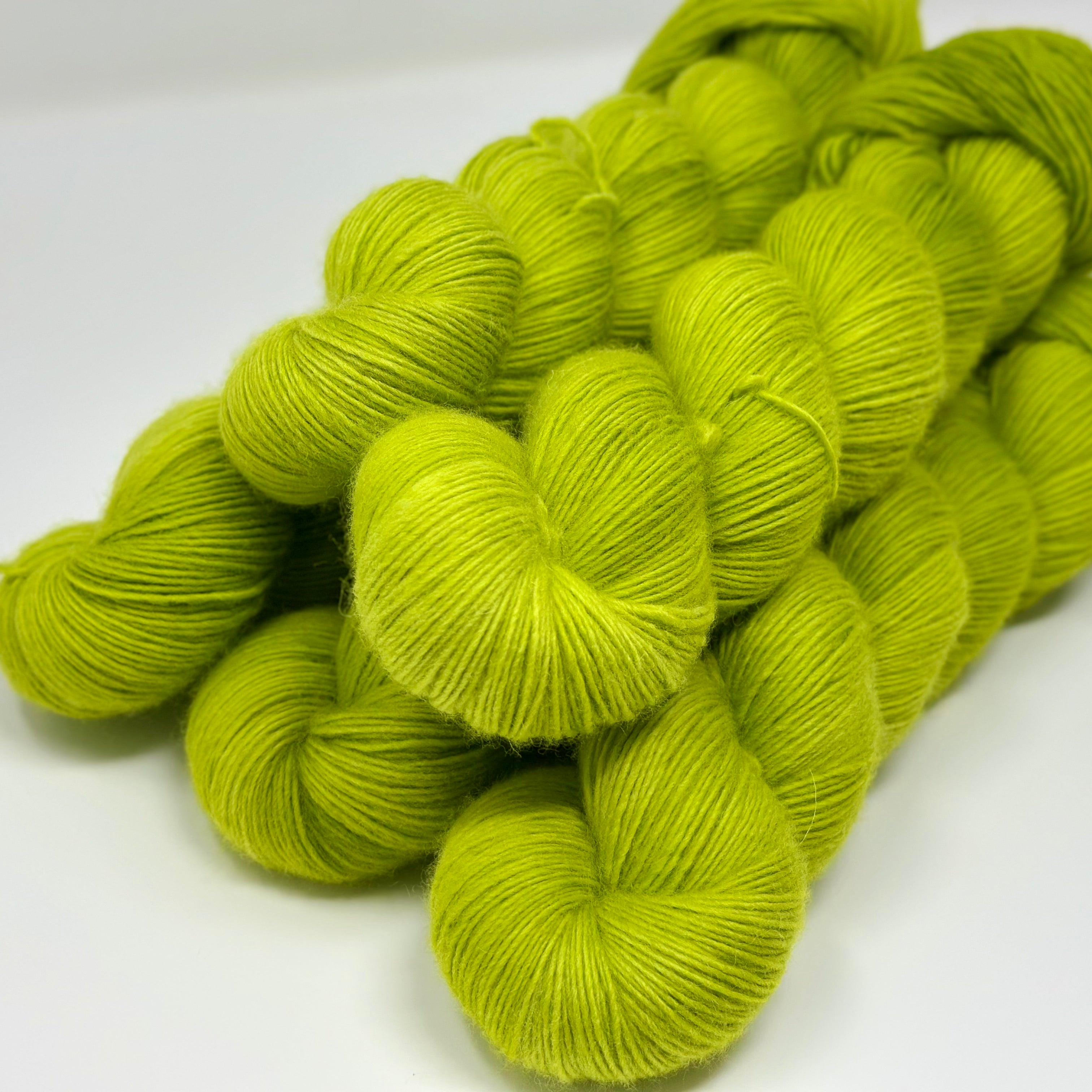 Organic Merino Fingering yarn in Apple Jolly Rancher